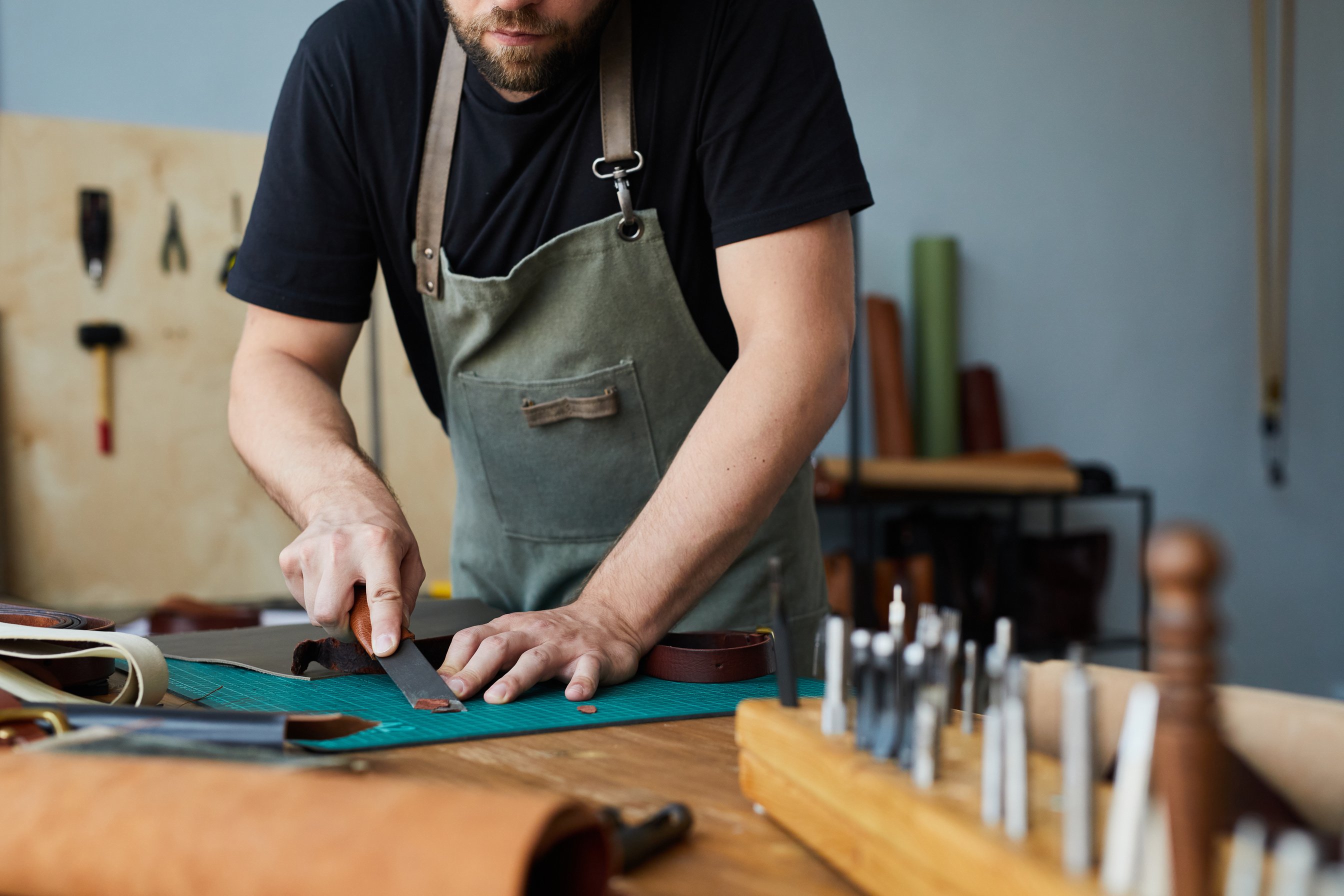 Male Tanner Working